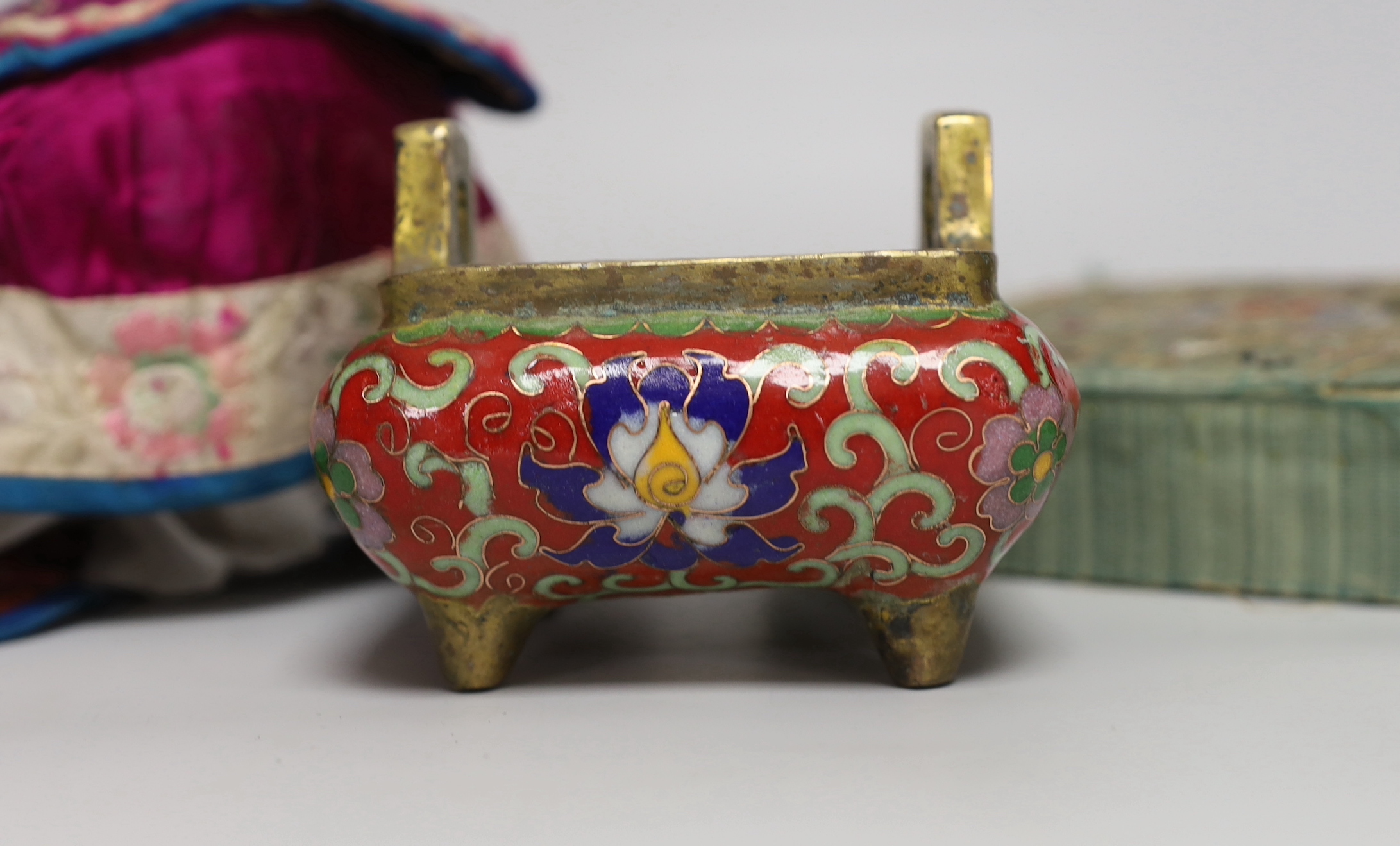 A Chinese cloisonné enamel censer, an embroidered hat and similar silk embroidered box (3)